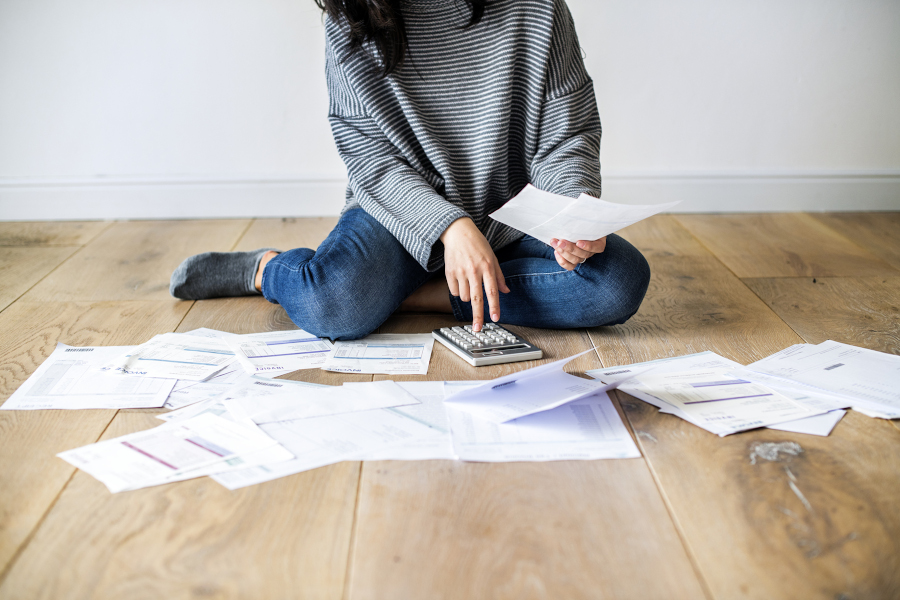 Woman managing finances at home